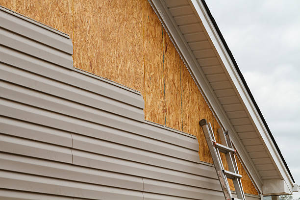 Professional Storm Damage Siding Repair technician working in Ruffin, NC